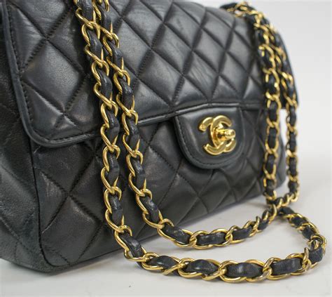 black chanel bag with gold chain|chanel black quilted flap bag.